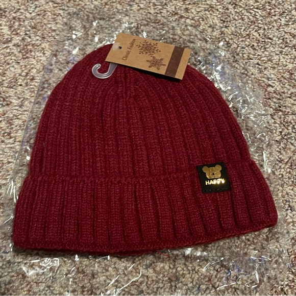 Kids unisex Cozy red knit beanie with 'Happy' label. - Picture 1 of 1